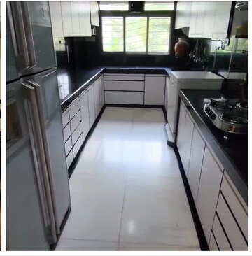 Kitchen in 4 BHK Apartment at Rustomjee 9 JVPD, Juhu – for Sale