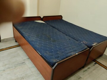Bedroom in 2 BHK Builder Floor at RWA Apartments Sector 26, Sector 26 – for Rent