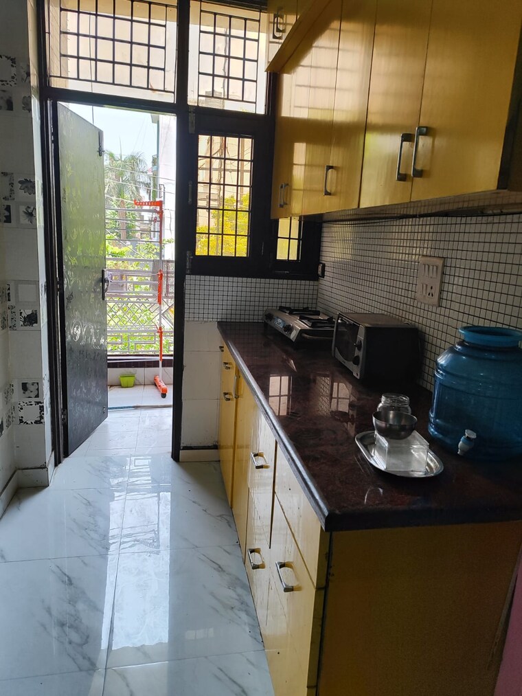Kitchen, rwa-apartments-sector-30 1.5 Bedroom 650 Sq.Ft. Independent House In Sector 30 Noida 9303027