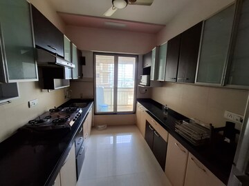Kitchen in 2 BHK Apartment at Rustomjee OZone, Goregaon West – for Rent