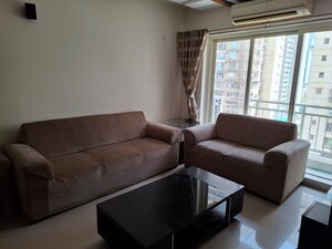 Living Room in 2 BHK Apartment at Rustomjee OZone, Goregaon West – for Rent