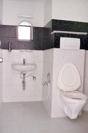 Bathroom in 4 BHK Apartment at Unishire The Ledge, Jakkuru – for Rent