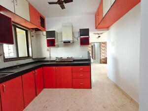 Kitchen in 3 BHK Apartment at Swastik Regalia, Waghbil – for Rent