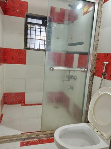 Bathroom in 3 BHK Apartment at Swastik Regalia, Waghbil – for Rent