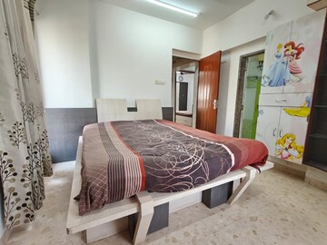 Bedroom in 3 BHK Apartment at Swastik Regalia, Waghbil – for Rent