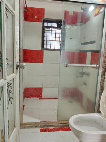 Bathroom in 3 BHK Apartment at Swastik Regalia, Waghbil – for Rent