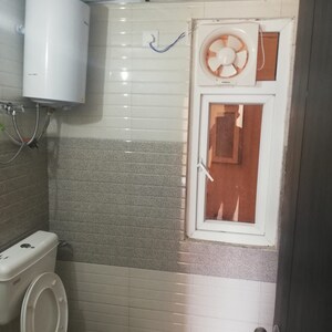 Bathroom in 1 BHK Apartment at Signature Global Orchard Avenue, Sector 93 – for Rent
