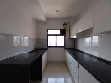 Kitchen in 2 BHK Apartment at Lalani Velentine Apartment 1 Wing D, Malad East – for Sale