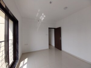 Room in 2 BHK Apartment at Lalani Velentine Apartment 1 Wing D, Malad East – for Sale