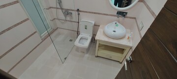 Bathroom in 3.5 BHK Apartment at Elite Golf Green, Sector 79 – for Rent