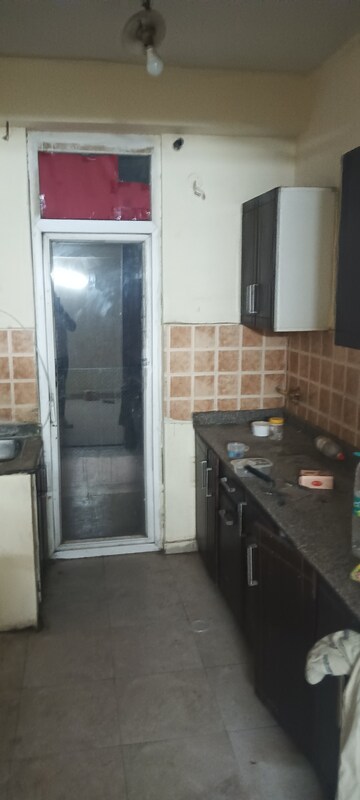 Kitchen in 2 BHK Apartment at Amrapali Empire, Sain Vihar – for Rent