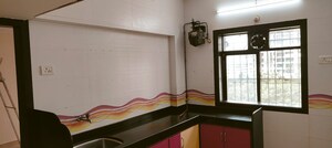 Kitchen in 2 BHK Apartment at Shiv Siddhi Lok Kailash, Mulund West – for Rent