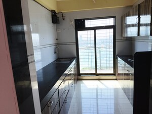 Kitchen in 3 BHK Apartment at Blue Kites CHS Ltd, Kopar Khairane – for Rent