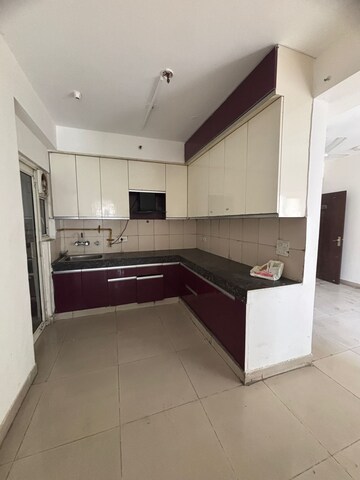 Kitchen in 2.5 BHK Apartment at Panchsheel Greens II, Sector 16 Greater Noida – for Sale