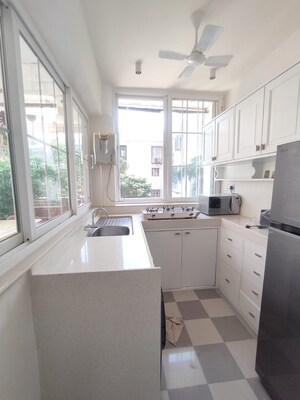 Kitchen in 3 BHK Apartment at Cozy Home, Bandra West – for Rent