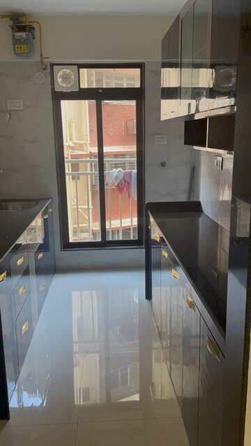 Kitchen in 1 BHK Apartment at Je And Vee Om Trimurti, Malad East – for Rent