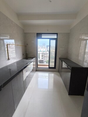 Kitchen in 2 BHK Apartment at Je and Vee Madhuban, Malad East – for Rent