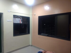 Living Room in 2 BHK Apartment at Mahim – for Sale