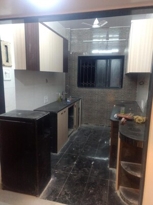 Kitchen in 2 BHK Apartment at Mahim – for Sale