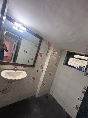 Bathroom in 2 BHK Apartment at Neel Sagar Vile Parle West, Vile Parle West – for Rent