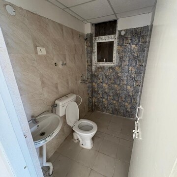Bathroom in 2.5 BHK Apartment at Signature The Millennia 2, Garoli Kalan – for Rent