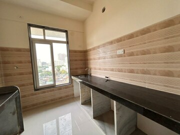 Kitchen in 1.5 BHK Apartment at Sheth Avante, Kanjurmarg West – for Rent
