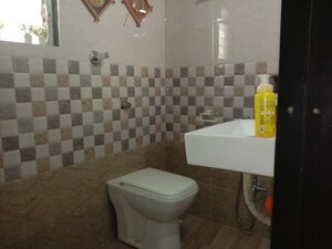 Bathroom in 2 BHK Apartment at Yogi Hills, Mulund West – for Rent