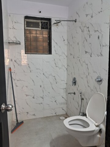 Bathroom in 2 BHK Apartment at Dosti Blossom, Wadala East – for Rent