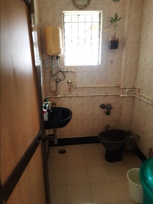 Bathroom in 2 BHK Apartment at Shreya Palace CHS, Kalyan West – for Rent