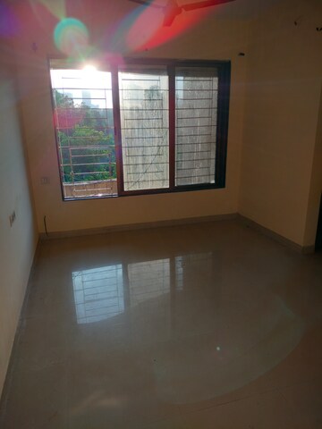 Living Room in 1 BHK Apartment at Ajmera Yogi Dham Phase III, Kalyan West – for Rent