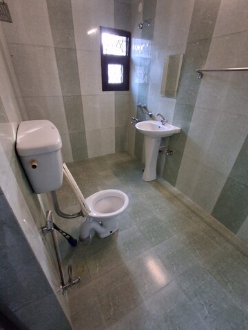 Bathroom in 2 BHK Apartment at Vasant Kunj – for Sale