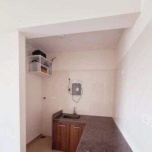 Kitchen in 1 BHK Apartment at Duville Riverdale Suites, Santipur – for Sale