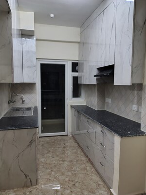 Kitchen in 3 BHK Apartment at Amrapali Terrace Homes, Tech Zone 4 Greater Noida – for Rent