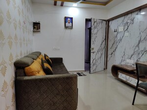 Living Room in 1 BHK Apartment at Unique Greens Ghodbunder Road, Ghodbunder Road – for Rent