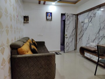 Living Room in 1 BHK Apartment at Unique Greens Ghodbunder Road, Ghodbunder Road – for Rent