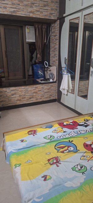 Bedroom in 1.5 BHK Apartment at Chamunda Heritage, Andheri East – for Sale