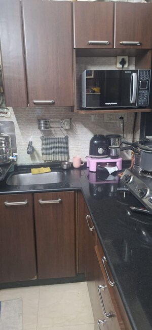 Kitchen in 1.5 BHK Apartment at Chamunda Heritage, Andheri East – for Sale