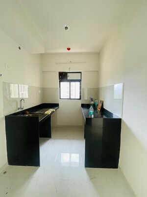 Kitchen in 1 BHK Apartment at Runwal Gardens, Dombivli East – for Rent