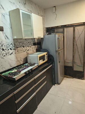 Furnished Amenities in 2 BHK Apartment at Tolaram Building, Chembur – for Rent