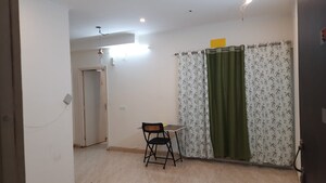 Living Room in 2 BHK Apartment at Gaur Yamuna City, Gaur Yamuna City – for Rent