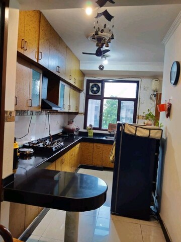 Kitchen in 3 BHK Apartment at Unitech Uniworld Gardens 2, Sector 47 – for Rent
