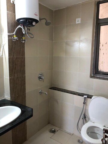 Bathroom in 2 BHK Apartment at Unitech Uniworld Gardens 2, Sector 47 – for Rent