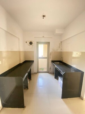 Kitchen in 2 BHK Apartment at Casa Rio Viva, Dombivli East – for Rent