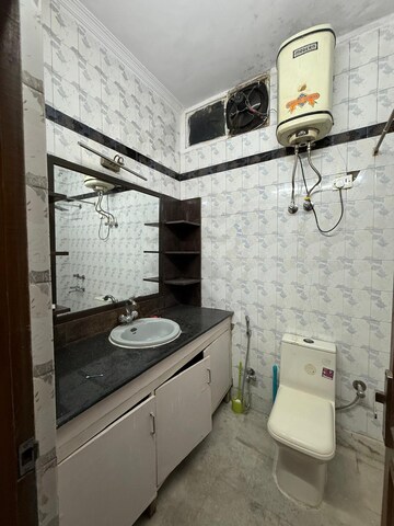 Bathroom in 1 BHK Builder Floor at Kalkaji – for Rent