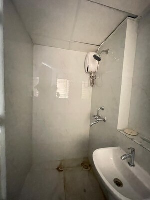Bathroom in 2 BHK Apartment at Runwal Gardens, Dombivli East – for Sale