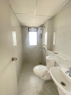 Bathroom in 2 BHK Apartment at Runwal Gardens Phase I, Dombivli East – for Rent