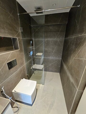 Bathroom in 2 BHK Apartment at Pebbles Marina, Santacruz West – for Sale