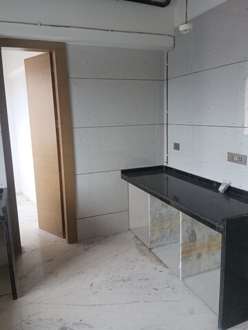Kitchen in 4 BHK Apartment at Laxmi Raajvilas, Goregaon West – for Sale