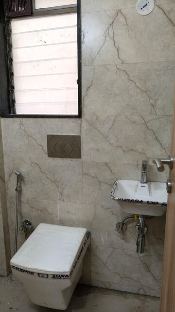 Bathroom in 2 BHK Apartment at Eskay Venture Itus, Andheri West – for Rent