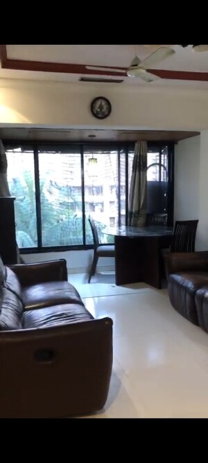 Living Room in 1 BHK Apartment at Solitaire Malad West, Malad West – for Rent